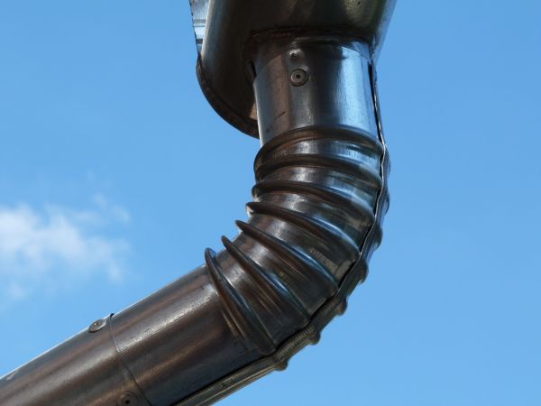 Metal Downspout Installation in Southport